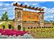 Community entrance sign for Southern Hills with stone pillars, wooden signage, and colorful landscaping at 1613 Fuma Leaf Way # 273, Mcdonough, GA 30253