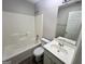 Bathroom featuring tub/shower combo and vanity with undermount sink at 110 Peridot Pl, South Fulton, GA 30349