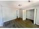 This bedroom features neutral walls, carpet flooring, and a closet for storage at 110 Peridot Pl, South Fulton, GA 30349