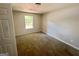 Bedroom with carpet and natural light from the window at 110 Peridot Pl, South Fulton, GA 30349