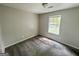 Bedroom with carpet and natural light from the large window at 110 Peridot Pl, South Fulton, GA 30349