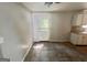 The kitchen features neutral walls and floors, and access to the outdoors at 110 Peridot Pl, South Fulton, GA 30349