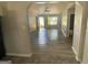 Spacious living room area with lots of natural light and hardwood floors at 110 Peridot Pl, South Fulton, GA 30349