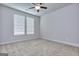 Neutral bedroom with carpet, ceiling fan and natural light at 6116 Ripple Way # 47, South Fulton, GA 30349