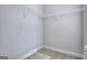 Walk-in closet with carpet flooring and wire shelving, offering ample storage space at 6116 Ripple Way # 47, South Fulton, GA 30349