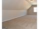 Bright bedroom with vaulted ceiling and carpet flooring at 329 Rays Ct # 12, Grayson, GA 30017