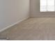 Spacious bedroom with wall-to-wall carpet and large window at 329 Rays Ct # 12, Grayson, GA 30017