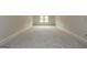 Spacious bedroom with large window and neutral walls at 329 Rays Ct # 12, Grayson, GA 30017