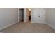 Bright bedroom featuring carpet, and access to a bathroom and closet at 329 Rays Ct # 12, Grayson, GA 30017