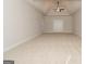 Spacious bonus room with double doors and ceiling fan at 329 Rays Ct # 12, Grayson, GA 30017