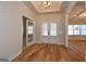 Bright entryway with hardwood floors and French doors at 329 Rays Ct # 12, Grayson, GA 30017
