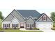 Two-story home with gray siding, red shutters, and a two-car garage at 329 Rays Ct # 12, Grayson, GA 30017