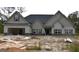 Two-story home with gray siding and a two-car garage at 329 Rays Ct # 12, Grayson, GA 30017