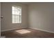 Bedroom featuring neutral paint and carpet with a window providing natural light at 207 Millwheel Dr, Villa Rica, GA 30180