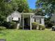 Charming single-story home featuring a well-maintained lawn and classic architectural details at 544 Westmeath Sw Dr, Atlanta, GA 30310
