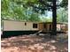 Home exterior displaying a backyard deck space at 215 Highland Dr, Locust Grove, GA 30248