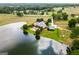Idyllic estate features a private lake, pool, guesthouse, and meticulously manicured grounds at 1875 Highway 142 E, Covington, GA 30014