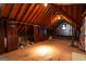 Large attic space with exposed beams and ample storage potential at 1875 Highway 142 E, Covington, GA 30014