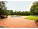 Wide backyard space with an in-ground pool with views of the lake at 1875 Highway 142 E, Covington, GA 30014