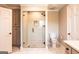 Bathroom featuring a glass shower, tile surround, and a neutral color scheme at 1875 Highway 142 E, Covington, GA 30014