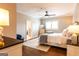 Bright bedroom featuring a ceiling fan, white bedding, and modern decor throughout at 1875 Highway 142 E, Covington, GA 30014
