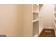 Walk-in closet featuring built-in shelving at 1875 Highway 142 E, Covington, GA 30014