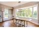Bright dining area with natural light and an island next to a scenic window at 1875 Highway 142 E, Covington, GA 30014