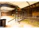 Interior view of a garage with open ceiling and wooden framework, presenting a functional and spacious storage area at 1875 Highway 142 E, Covington, GA 30014
