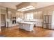 Well-equipped kitchen with stainless steel appliances, custom cabinetry, and an island at 1875 Highway 142 E, Covington, GA 30014