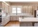 Bright kitchen with modern appliances, ample cabinetry, and hardwood floors at 1875 Highway 142 E, Covington, GA 30014