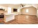Open living space with a kitchen, stainless steel appliances, and lots of natural light at 1875 Highway 142 E, Covington, GA 30014