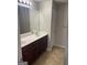 Main bathroom with double vanity and tile flooring at 121 Creighton Ln, Marietta, GA 30008