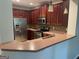 Kitchen with dark wood cabinets and stainless steel appliances at 121 Creighton Ln, Marietta, GA 30008