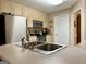 Kitchen sink and countertop view with stainless steel faucet at 5460 Creek Indian Trl, Douglasville, GA 30135