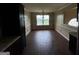 A bright dining room with wood-look flooring and neutral paint, perfect for Gathering gatherings at 3393 Madison Farm Way, Snellville, GA 30039