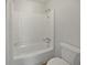 Bathroom featuring a combined bathtub and shower at 1084 Village Rd, Stone Mountain, GA 30088