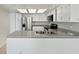 Kitchen with stainless steel appliances and tile flooring at 1084 Village Rd, Stone Mountain, GA 30088