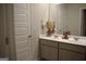 Bathroom with double vanity and storage at 1625 Zara Ln, Stockbridge, GA 30281