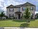 Two-story brick home with landscaped lawn at 1625 Zara Ln, Stockbridge, GA 30281