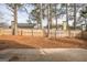 Fenced backyard with patio and mature trees at 4248 Brighton Nw Way, Kennesaw, GA 30144