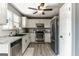 Kitchen with white cabinets, stainless steel appliances, and granite countertops at 4248 Brighton Nw Way, Kennesaw, GA 30144