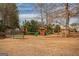 Community playground with playset and swings at 4248 Brighton Nw Way, Kennesaw, GA 30144