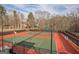 Two tennis courts with surrounding fence at 4248 Brighton Nw Way, Kennesaw, GA 30144