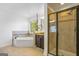 Spacious bathroom with soaking tub, tiled shower, granite countertop, and dark wood cabinets at 6510 Bentley Ridge Dr, Cumming, GA 30040