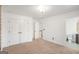 Spacious bedroom with carpet, closet, and en-suite bathroom at 6510 Bentley Ridge Dr, Cumming, GA 30040
