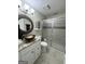 Bathroom featuring a modern vanity with a vessel sink and a glass-enclosed shower at 2606 Ramblewood Ct, Acworth, GA 30102