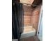 Bathroom featuring a wood plank wall and tub with a dark curtain at 2606 Ramblewood Ct, Acworth, GA 30102