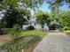 Charming single-story home with a lovely front yard and a covered carport at 2606 Ramblewood Ct, Acworth, GA 30102