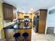 Well-equipped kitchen with granite countertops, stainless steel appliances, and a breakfast bar at 2606 Ramblewood Ct, Acworth, GA 30102