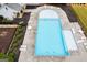 An aerial view of the community swimming pool, with ample lounge chairs at 1018 Nandina Ct, Villa Rica, GA 30180